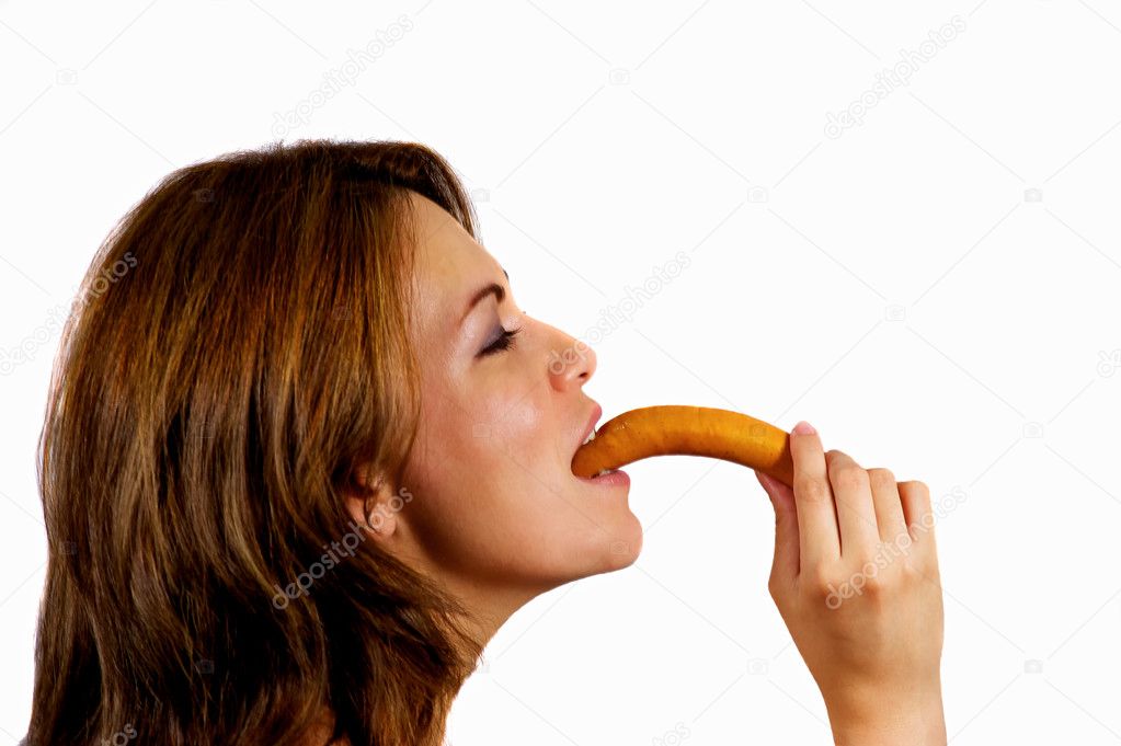 Women eating a sausage