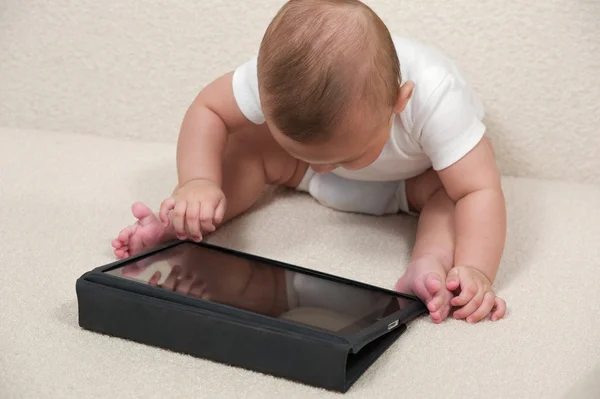 Baby with a computer — Stock Photo, Image