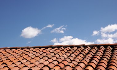 Shingled Roof with Blue Sky Background clipart