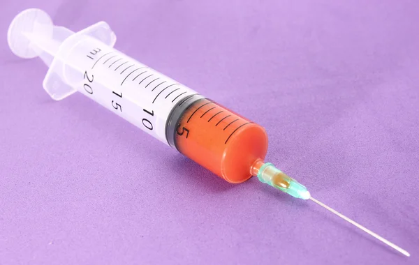 Syringe with blood — Stock Photo, Image