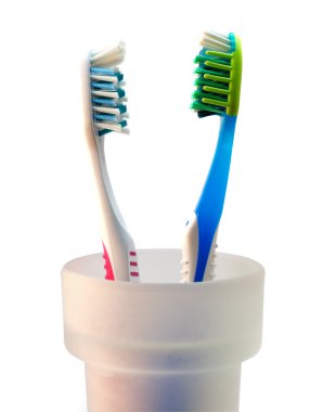 Two toothbrushs clipart