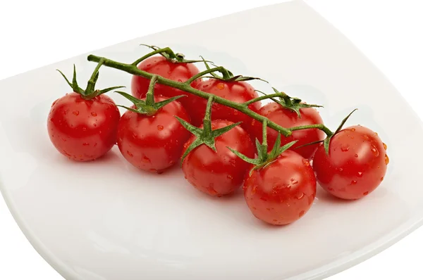 Tomates cereja na chapa — Fotografia de Stock