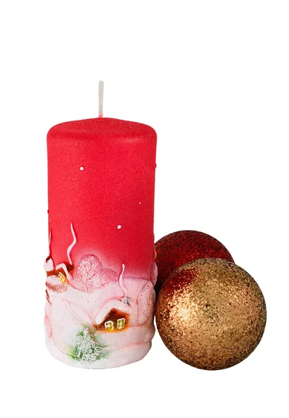 Vela de Navidad y dos bolas en blanco — Foto de Stock