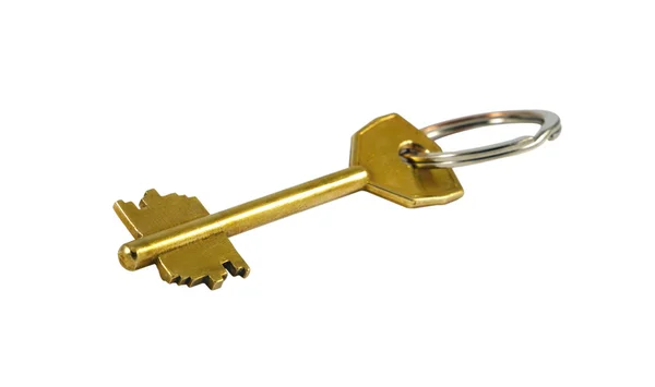 Один золотой ключ на белом с обрезкой пути — стоковое фото