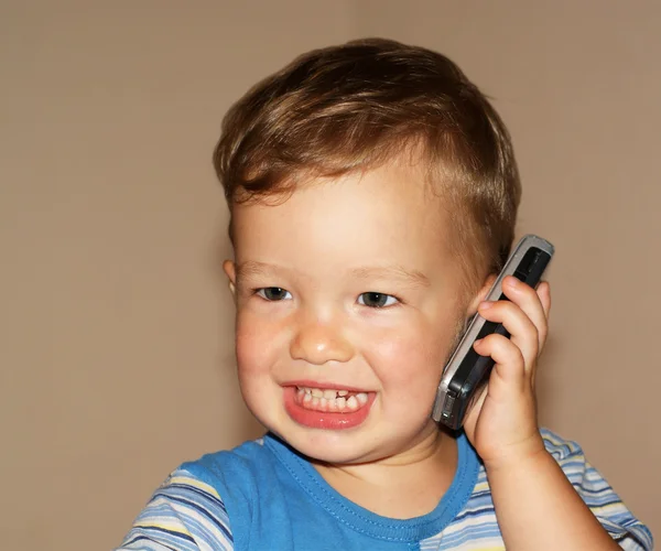 Baby is talking phone — Stock Photo, Image