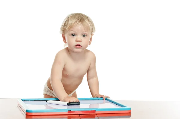 stock image Little boy with draw desk