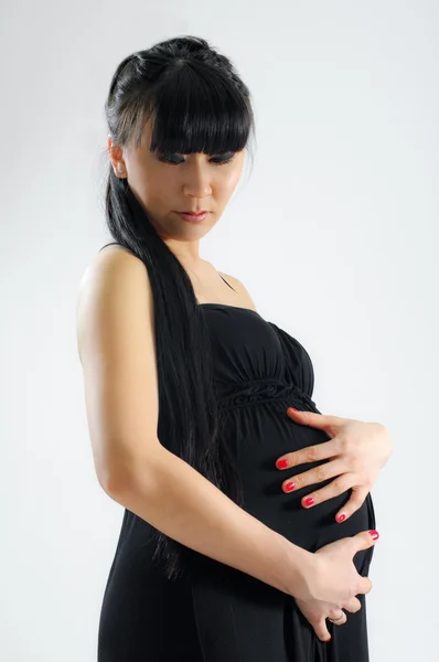 Asiatin schwanger — Stockfoto