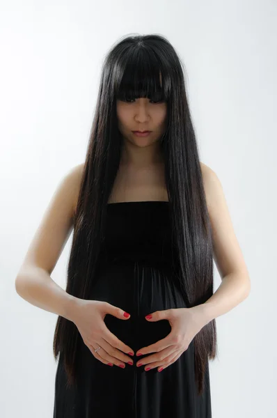 Asiatisk gravid - Stock-foto