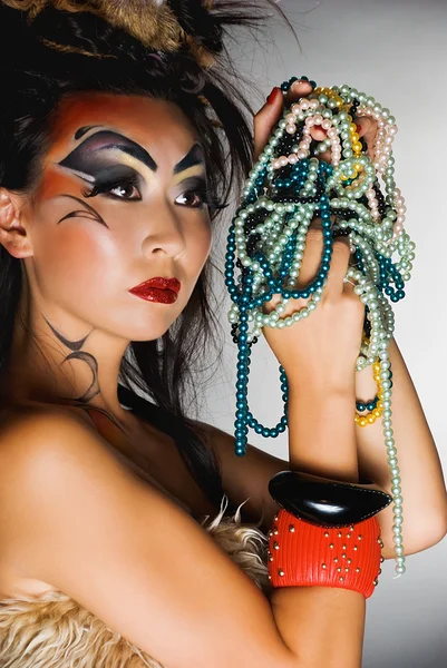 Model with beads — Stock Photo, Image