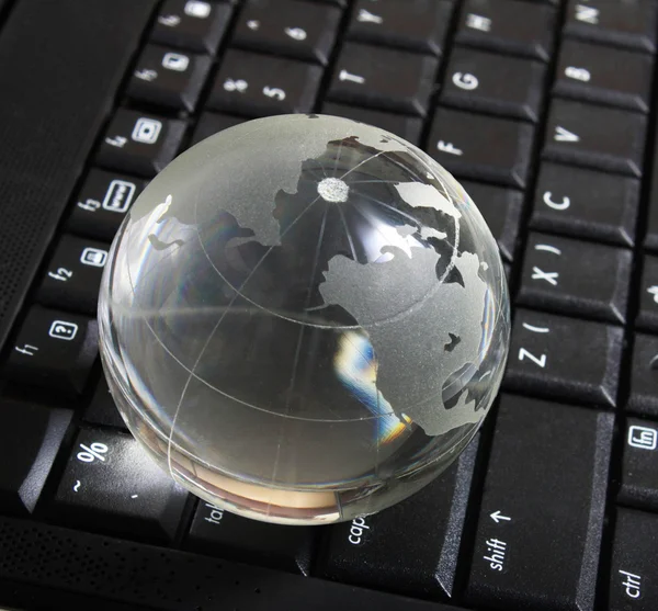 Globe on keyboard — Stock Photo, Image