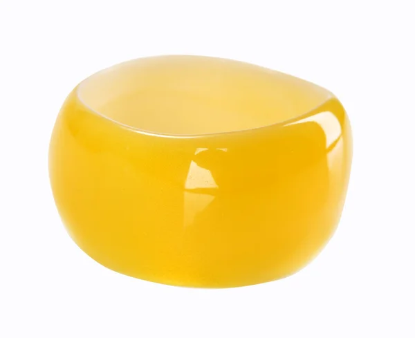 Желтый круглый пластиковый браслет — стоковое фото