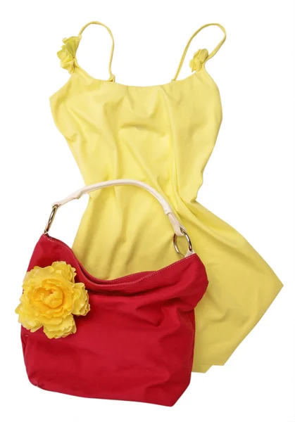 Žluté šaty košile halenka a červená taška — Stock fotografie