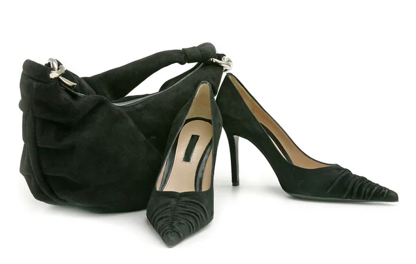 Черная обувь и сумка — стоковое фото