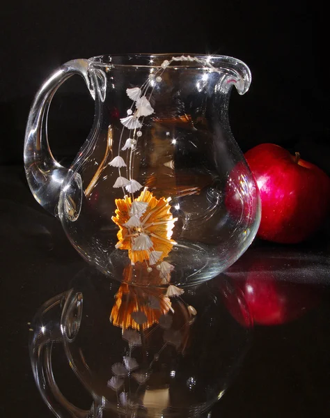 Glass pitcher jug on black background — Stock Photo, Image