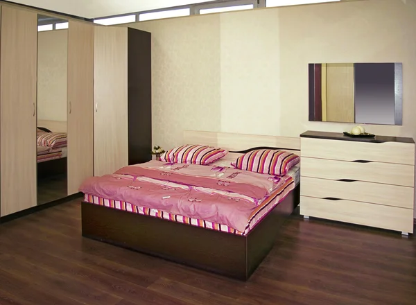 Dormitorio beige Imagen de stock