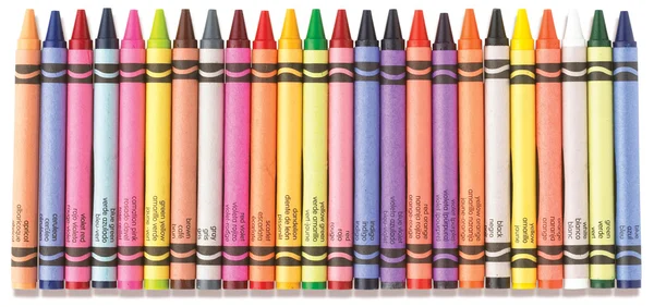 Row of colorful childrens crayons with clipping path — Stock Photo, Image