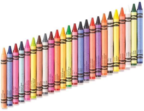 Angled row of colorful crayons with clipping path — Stock Photo, Image