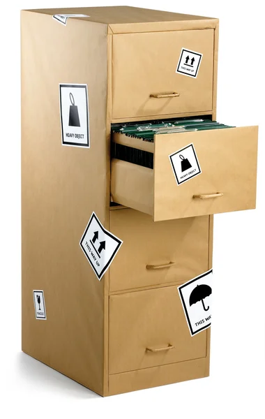 Armário de arquivamento embrulhado em papel marrom pronto para um movimento de escritório i — Fotografia de Stock