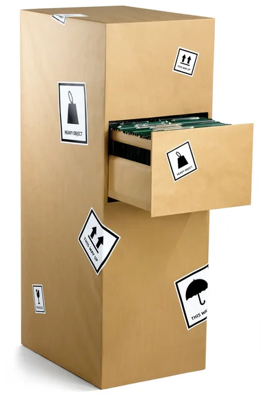 Armário de arquivamento envolto em papel marrom pronto para um movimento isolado — Fotografia de Stock