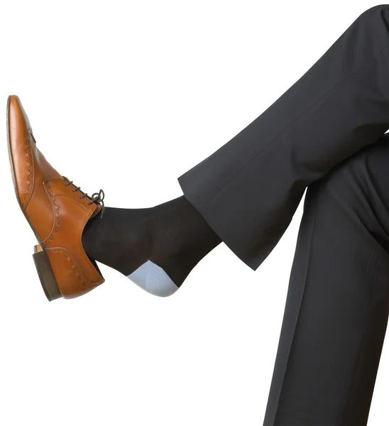 Pie de hombre jugando con su zapato aislado en blanco con un recorte —  Fotos de Stock