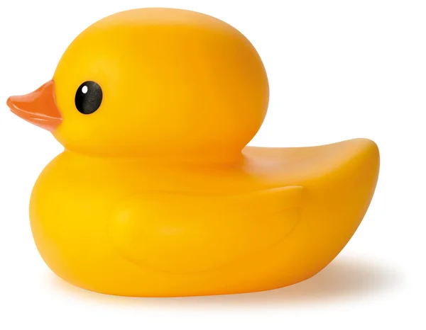 Beyaz bir arka plan üzerinde izole sarı lastik ördek banyo oyuncak — Stok fotoğraf