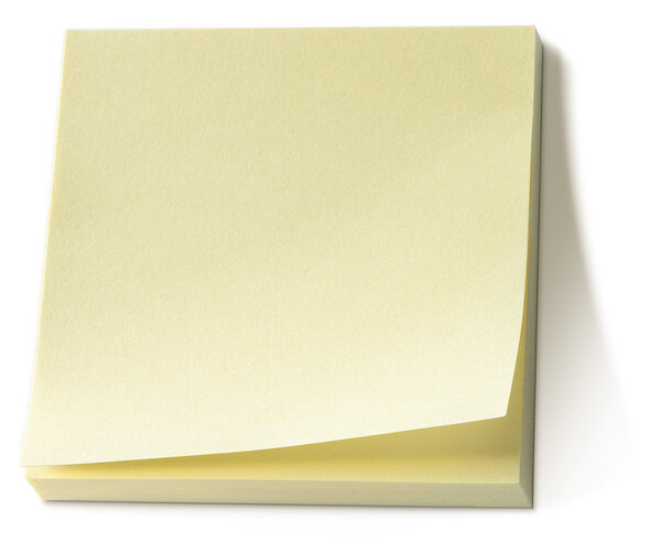 Yellow memo pad isolated on a white background