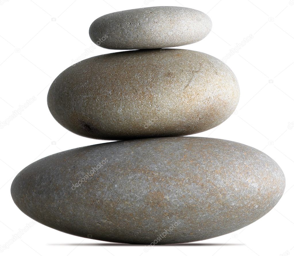 Three balanced pebbles on a white background with clipping path