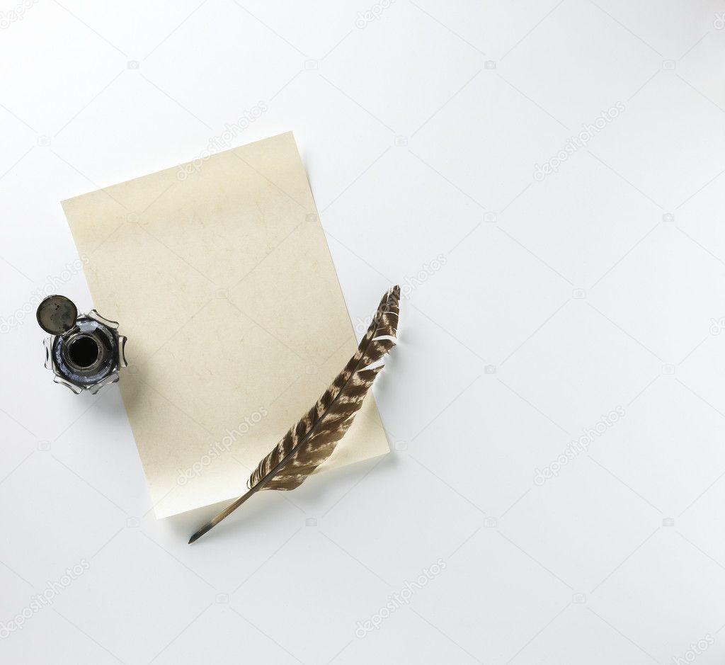 Blank parchment paper quill and ink pot with space for your copy