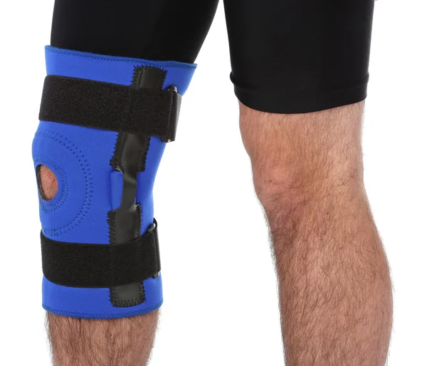 Man wearing a leg brace Stock Picture