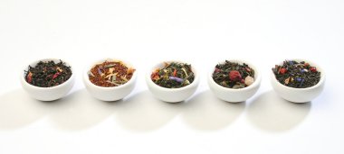 Various bowls of premiun tea leaves blends clipart