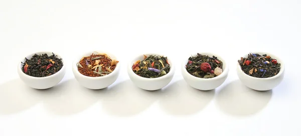 Various bowls of premiun tea leaves blends — Stock Photo, Image