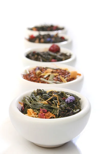 Various bowls of premiun tea leaves blends — Stock Photo, Image