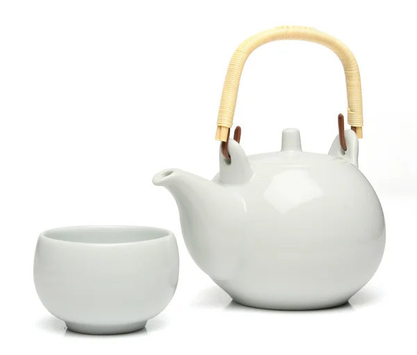 stock image Silver teapot pouring tea into chinese cup