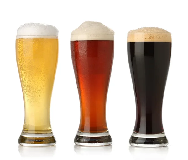 Три холодных пива — стоковое фото