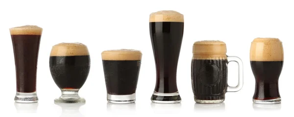 Differentglasses of stout beer — Stock Photo, Image