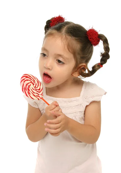 Bambino in possesso di un lecca-lecca con diverse espressioni — Foto Stock