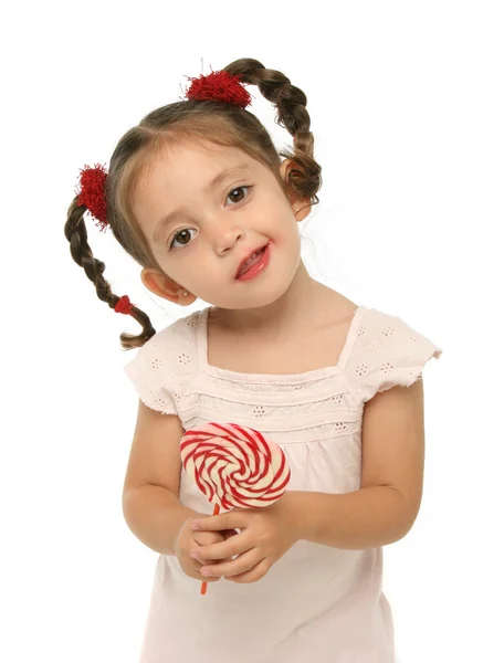 Bir lolipop farklı ifadelerle holding toddler — Stok fotoğraf