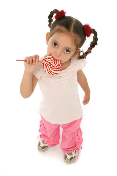 Kleinkind hält einen Lollypop mit verschiedenen Ausdrücken — Stockfoto