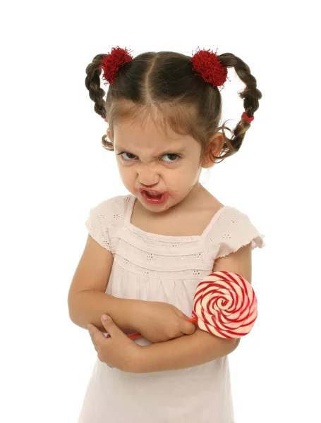 Criança segurando um pirulito com expressões diferentes — Fotografia de Stock