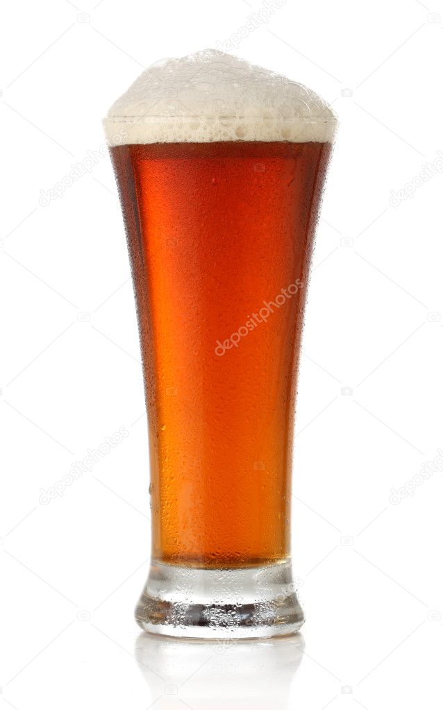 Fresh glass of beer isolated on white