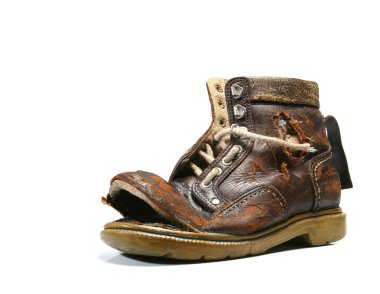 Old and bronken shoe. clipart