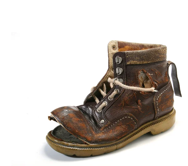 Alter und bronkener Schuh. — Stockfoto