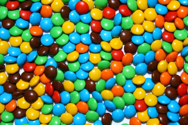 Čokoládové bonbony pozadí — Stock fotografie
