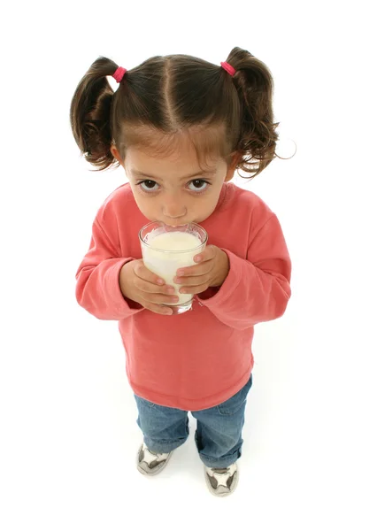 Cute little girl drinking milk — Stock Photo, Image