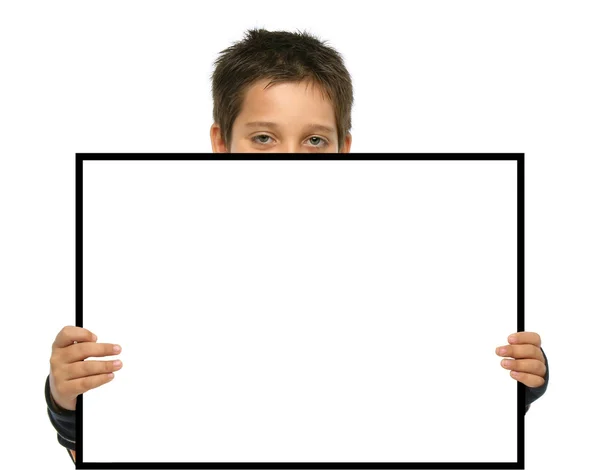 Niño sosteniendo un signo en blanco —  Fotos de Stock