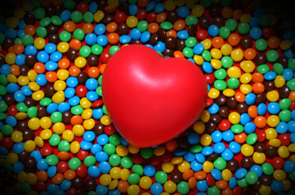 Soft red heart over candy background Obraz Stockowy