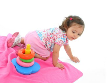 Toddler playing with generic toy clipart