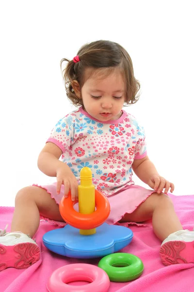 Criança brincando com brinquedo genérico — Fotografia de Stock