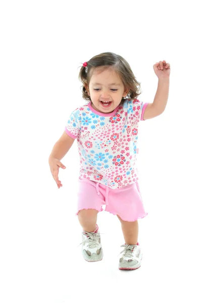 Lilla flickan ler och dans — Stockfoto