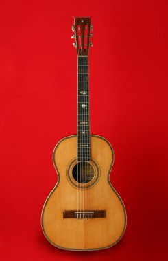 gitar kırmızı zemin üzerine